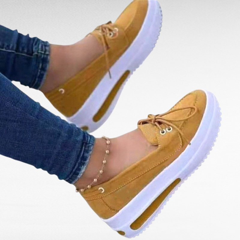 حذاء نسائي بدون رباط من الأمام بلون سادة