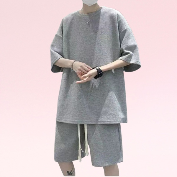 メンズカジュアルスーツ夏ユーストレンド半袖韓国風ルーズショートパンツスポーツハンサムツーピーススーツ