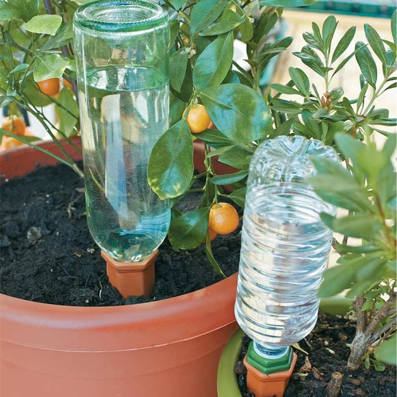 セラミック怠惰な自動花散水装置赤い陶器透水器 4 パックドリッパー庭点滴灌漑装置