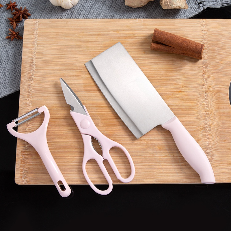 Dreiteiliges Set aus Küchenmesser, Schere und Schäler