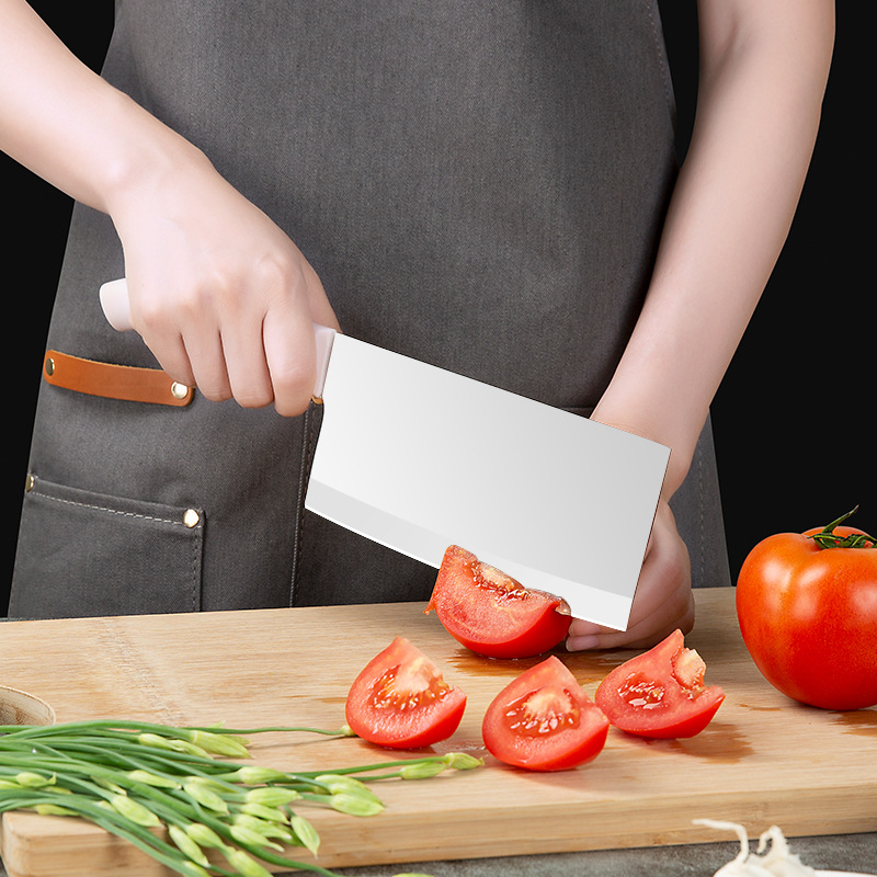 Dreiteiliges Set aus Küchenmesser, Schere und Schäler