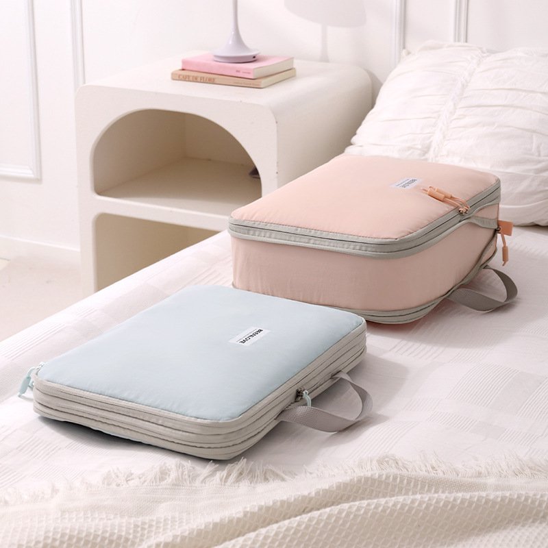 กระเป๋าเก็บของแบบบีบอัดสองหน้าใหม่