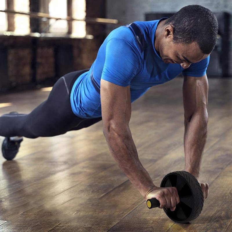 Pomocné zařízení pro břišní kolo pro domácí fitness