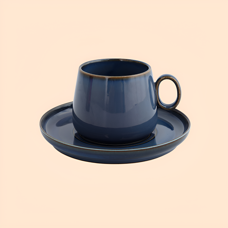 Kiln-changed coffee cup and saucer set