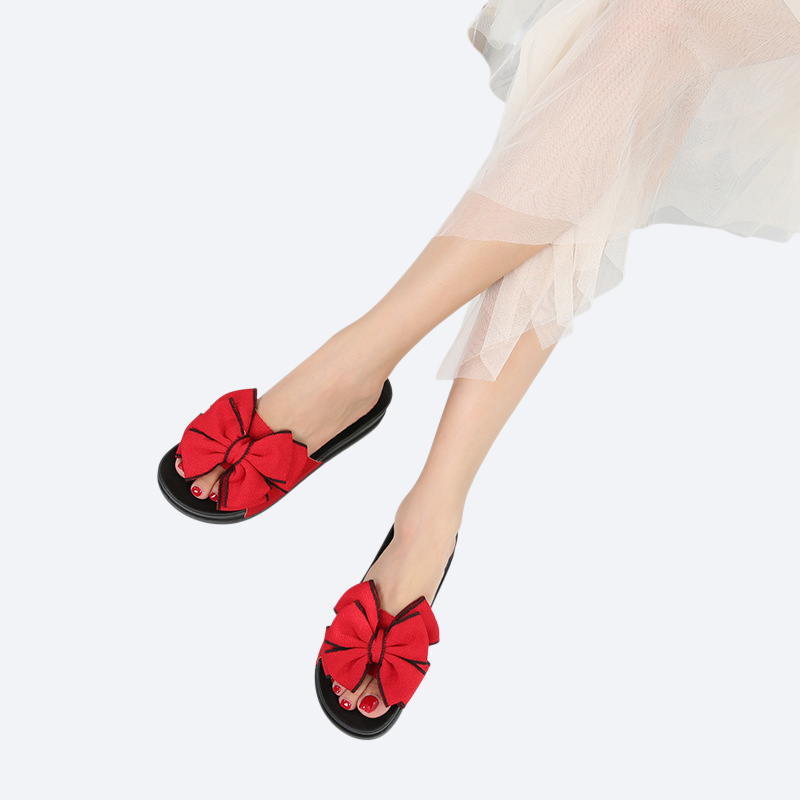 السيدات النعال بارد مع القوس