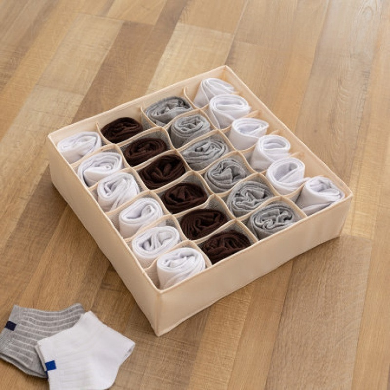 Caja de almacenamiento con divisor de tela