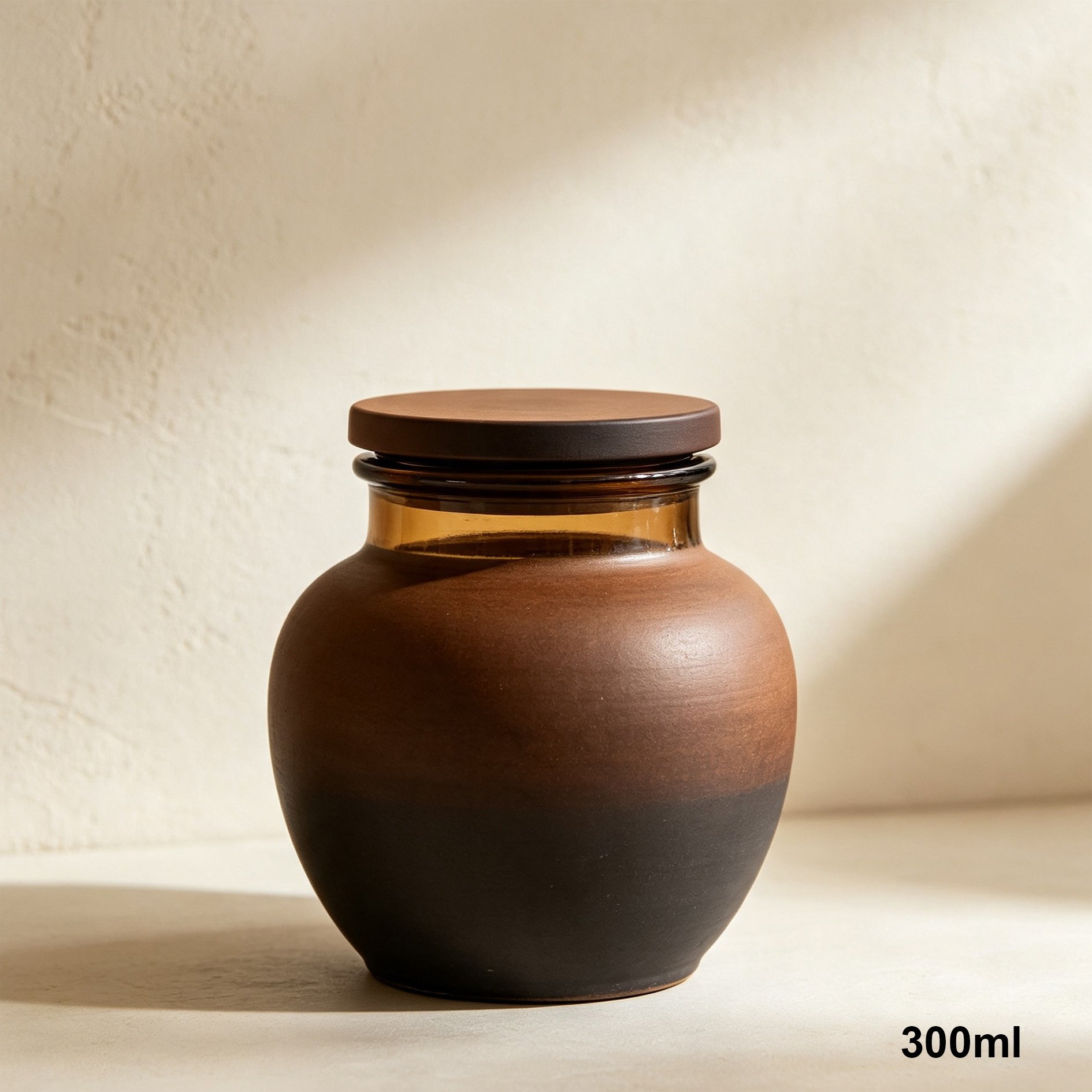 Hand holding a coarse ceramic tea jar with tea leaves inside