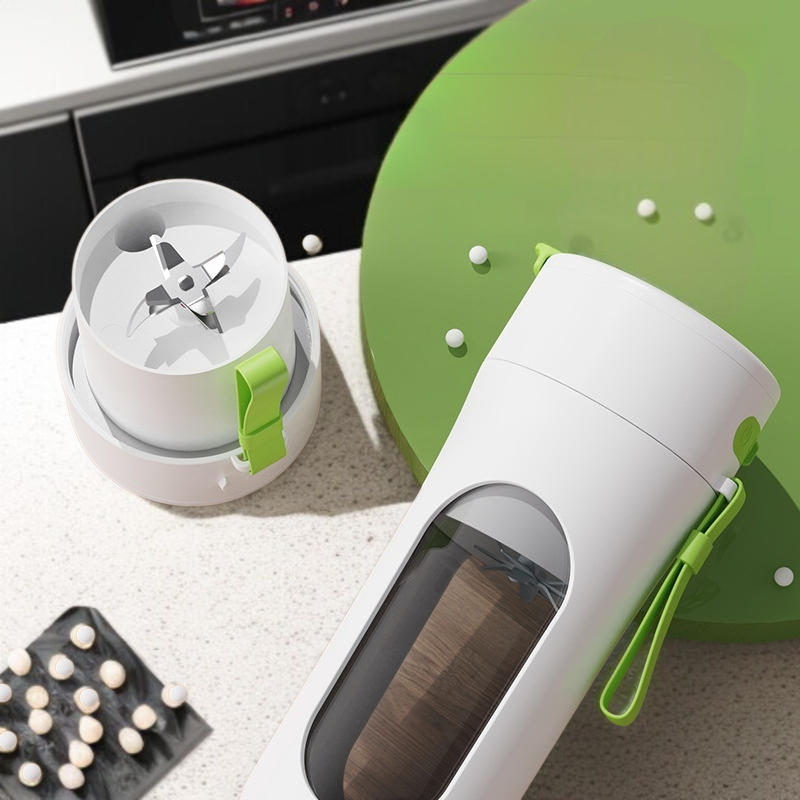 Taza de jugo portátil para el hogar con cuchillo de acero de 12 hojas