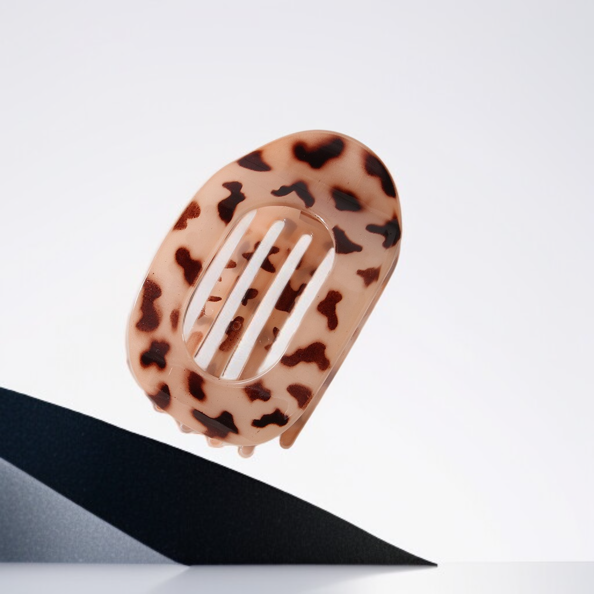 平らな楕円形のヘアクリップ