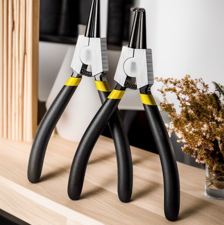 Close-up of sharp nose pliers with super hard spring