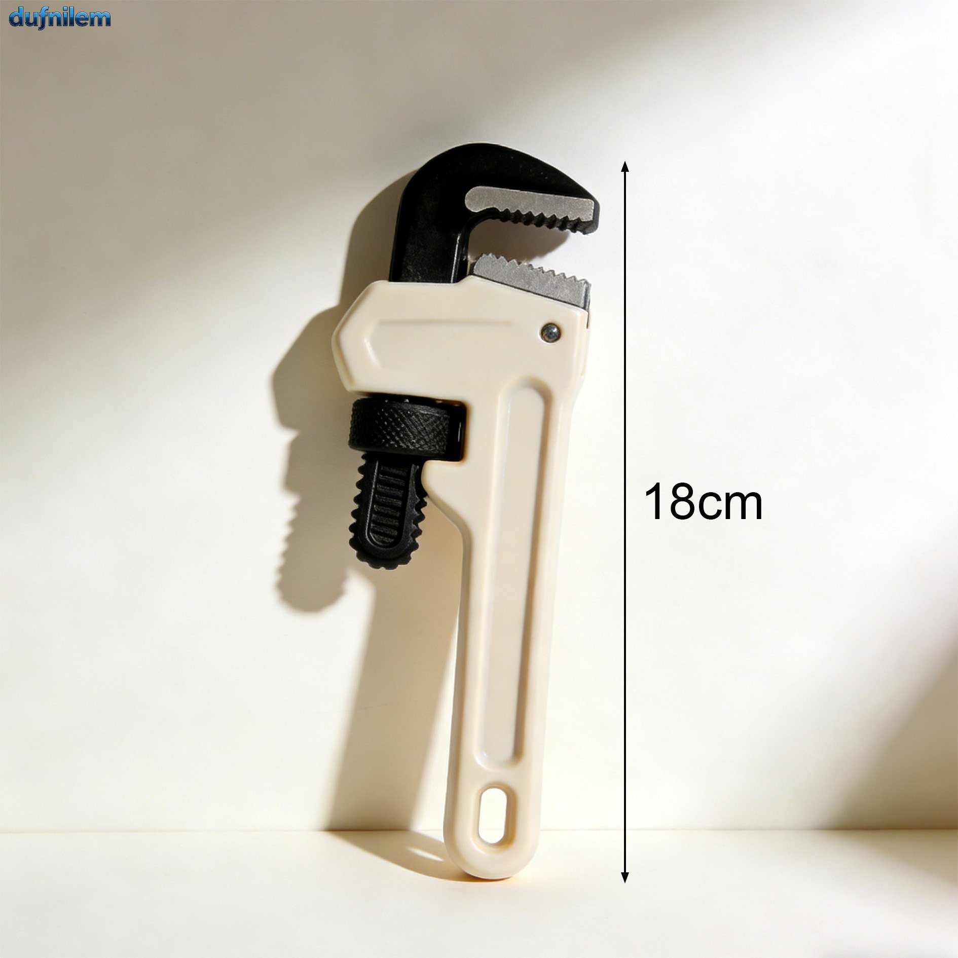 Durable multi-purpose pipe wrench in action
