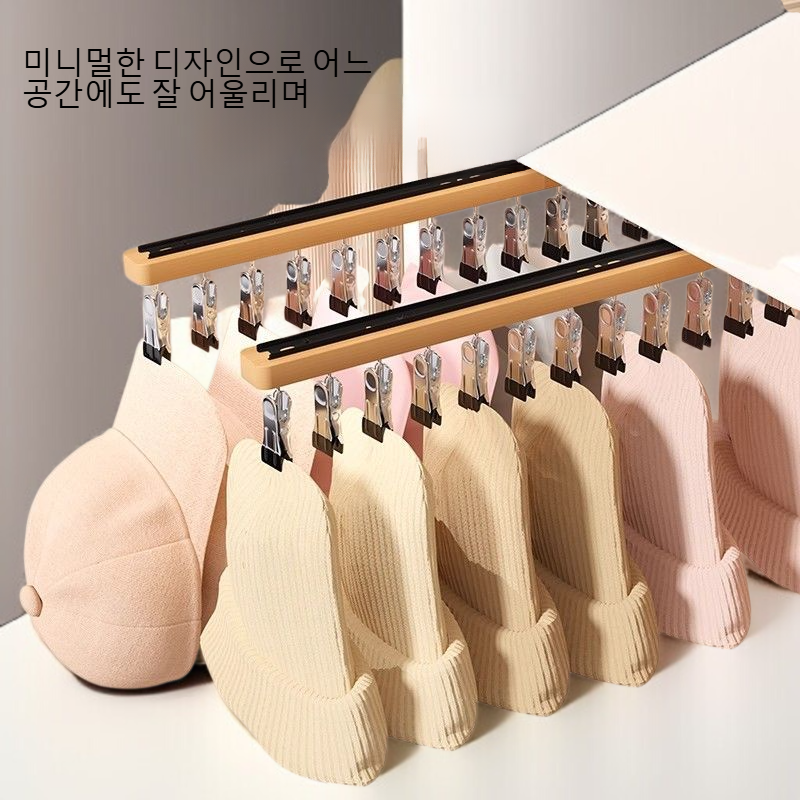 벽 손상 없이 설치된 신축 옷걸이