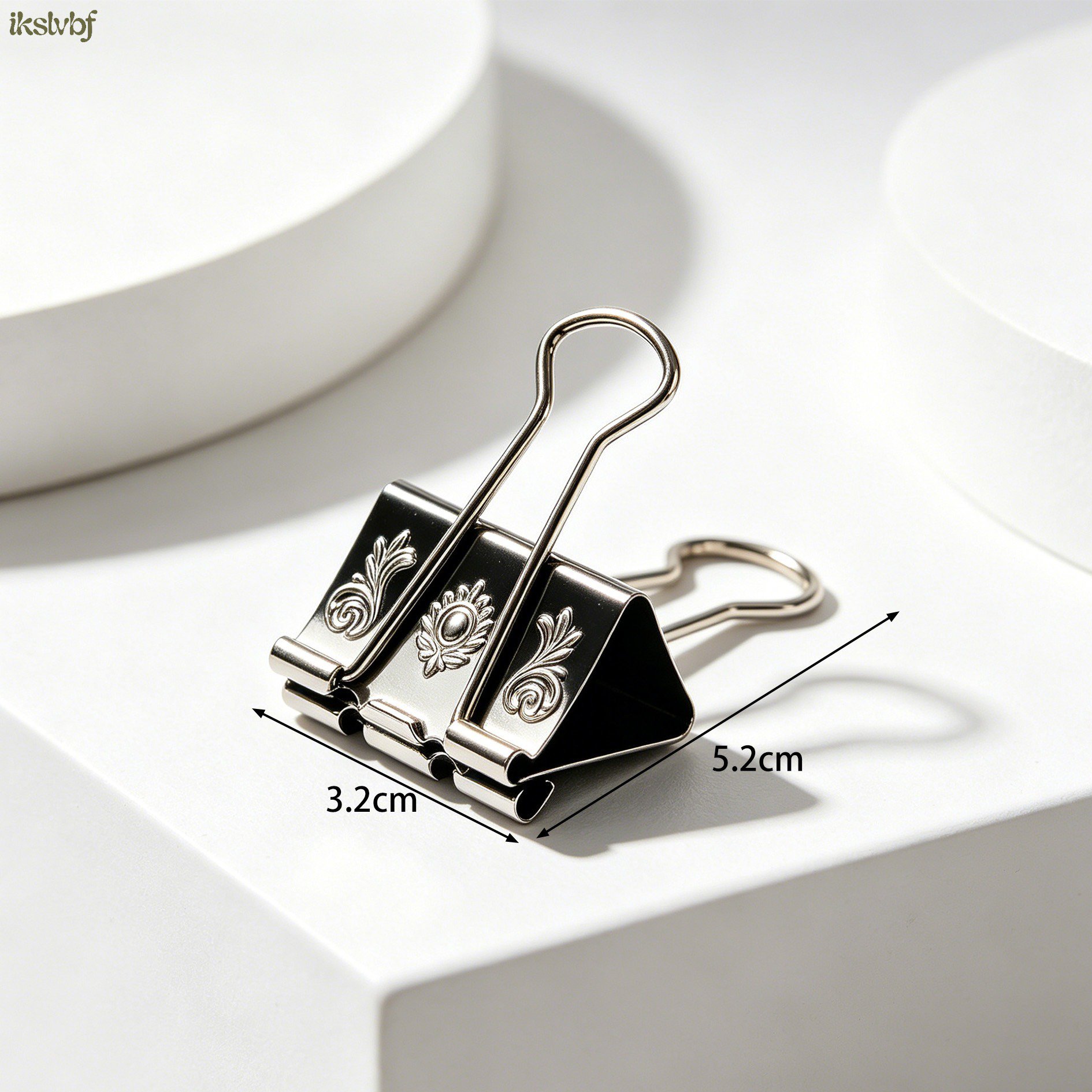 Reusable binder clips holding papers together