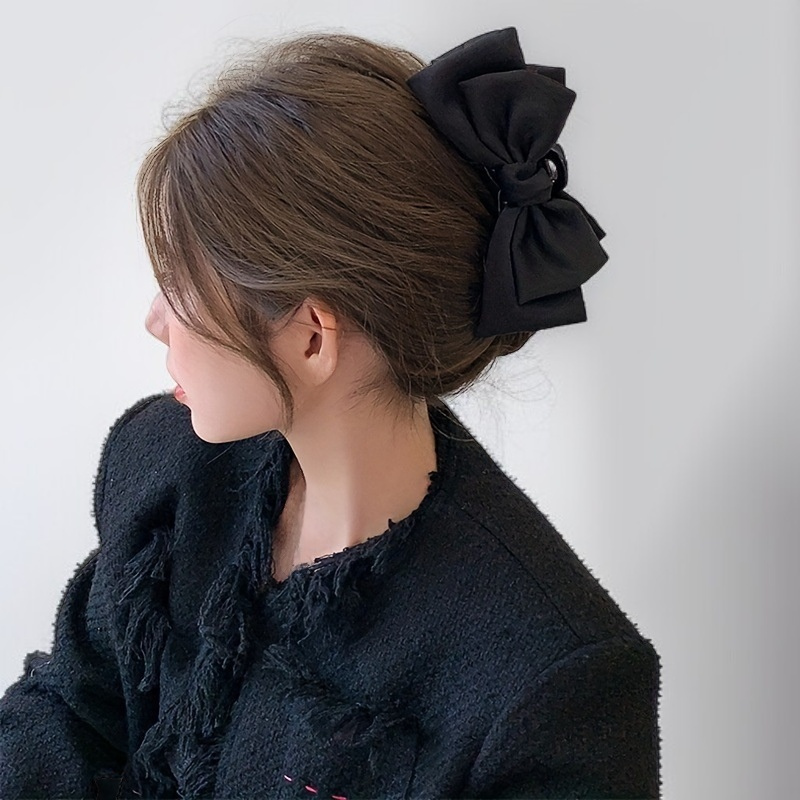 Clip de garra en forma de arco