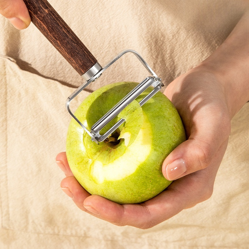 Kitchen apple and melon peeler