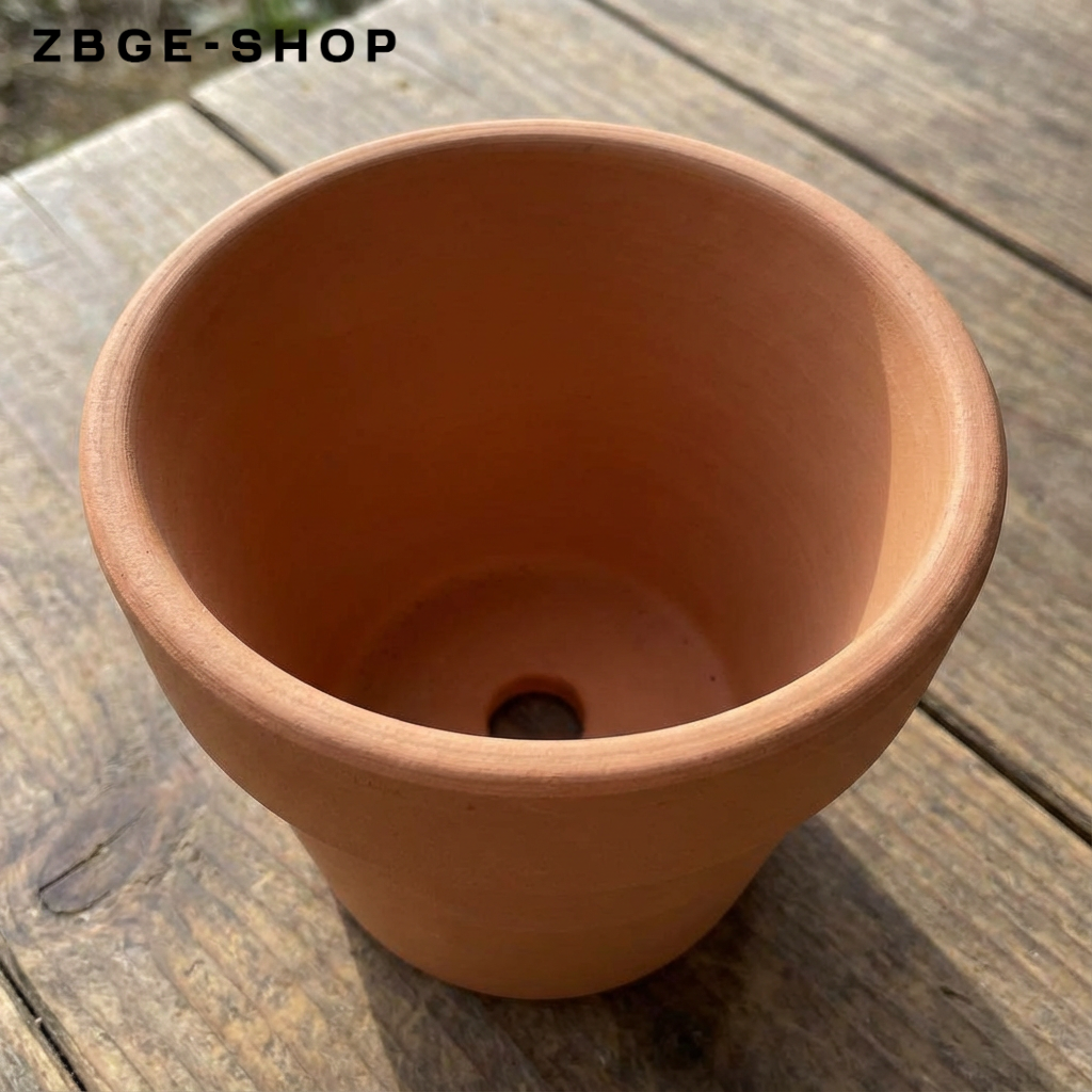 Mini-Pflanztopf für Zimmerpflanzen auf Fensterbank