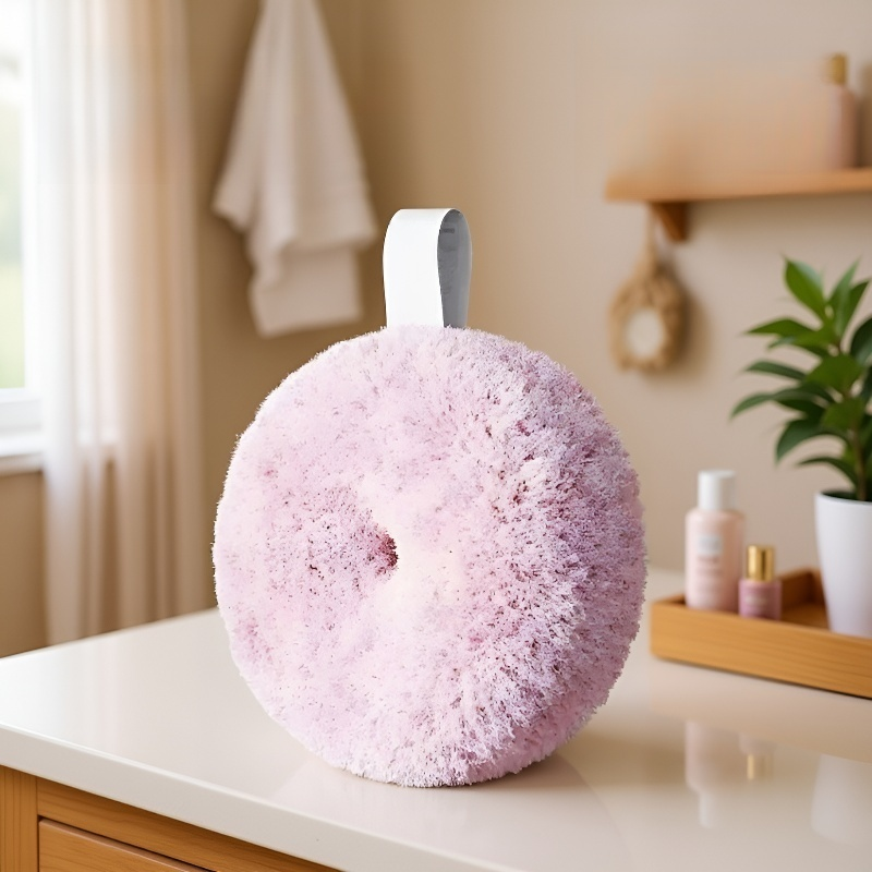 Close-up of brush cleaning countertop stains