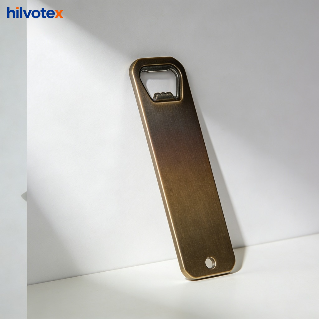 Keychain bottle opener attached to a keyring