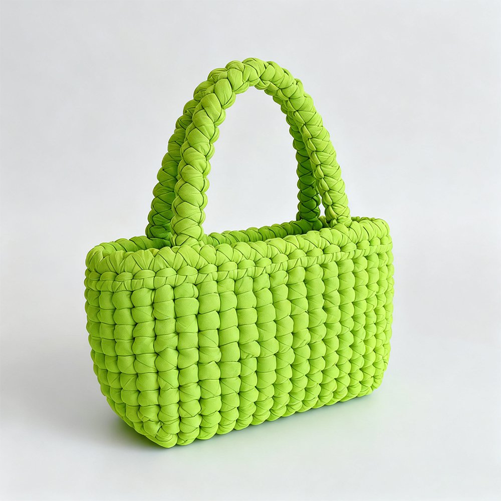 Handgefertigte grüne Flechttasche