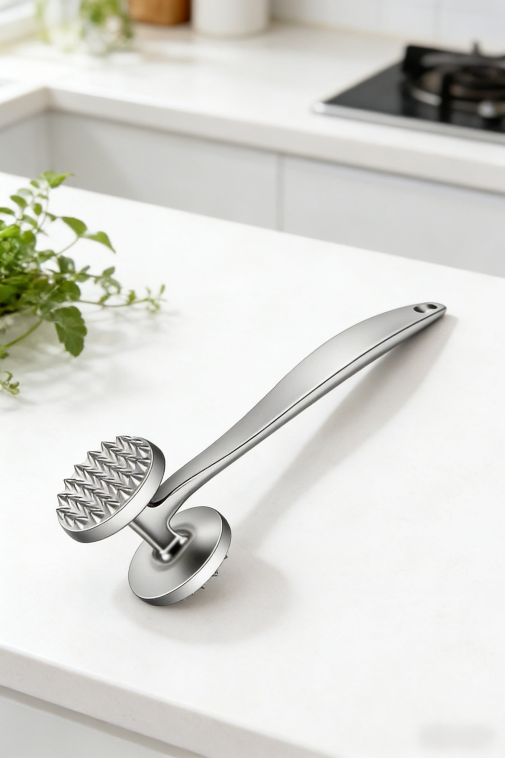 Stainless steel meat pounding device in kitchen