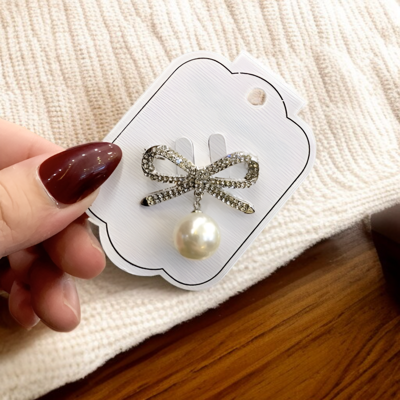 パールボウブローチ