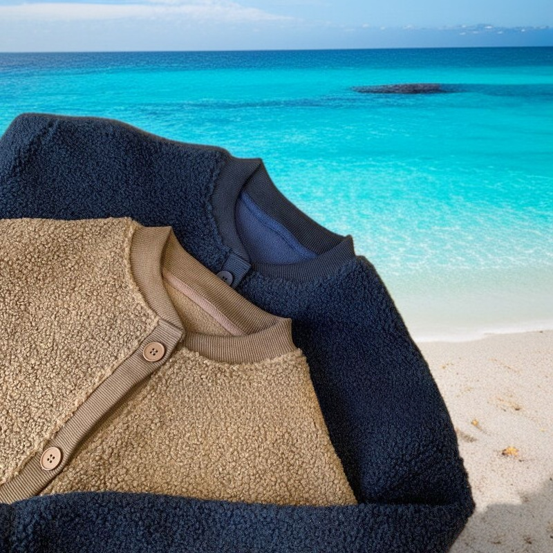 Elegante Knopfleiste beim Damenmantel aus Lammwolle