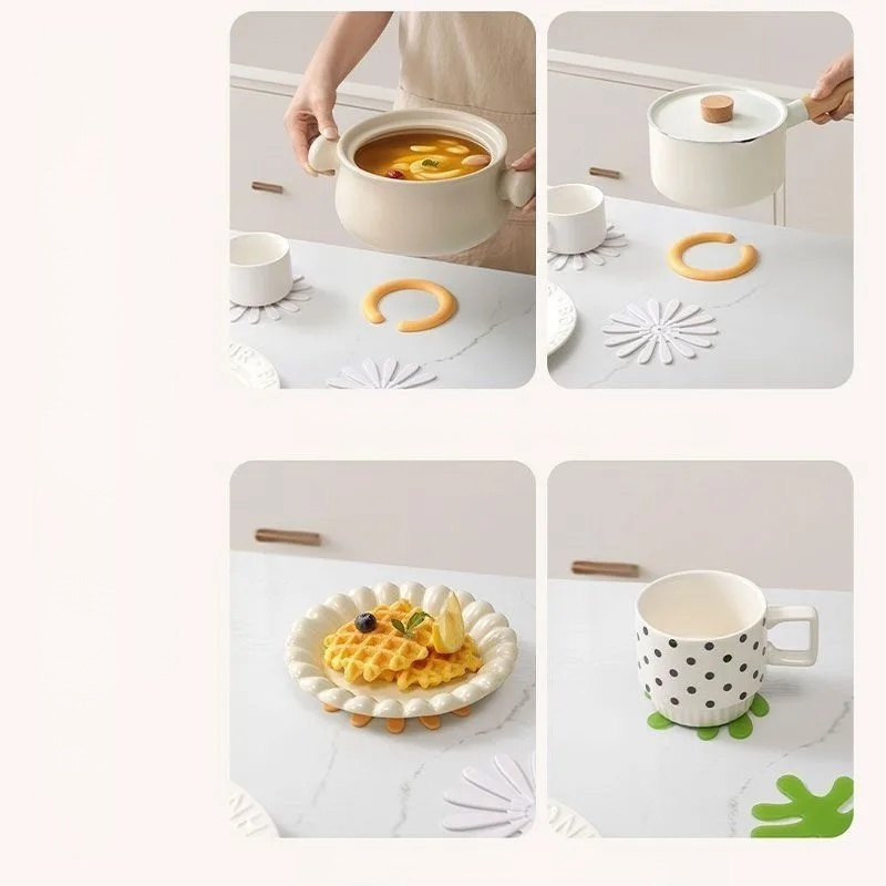 Odnímatelná podložka pod hrnec ve tvaru sedmikrásky