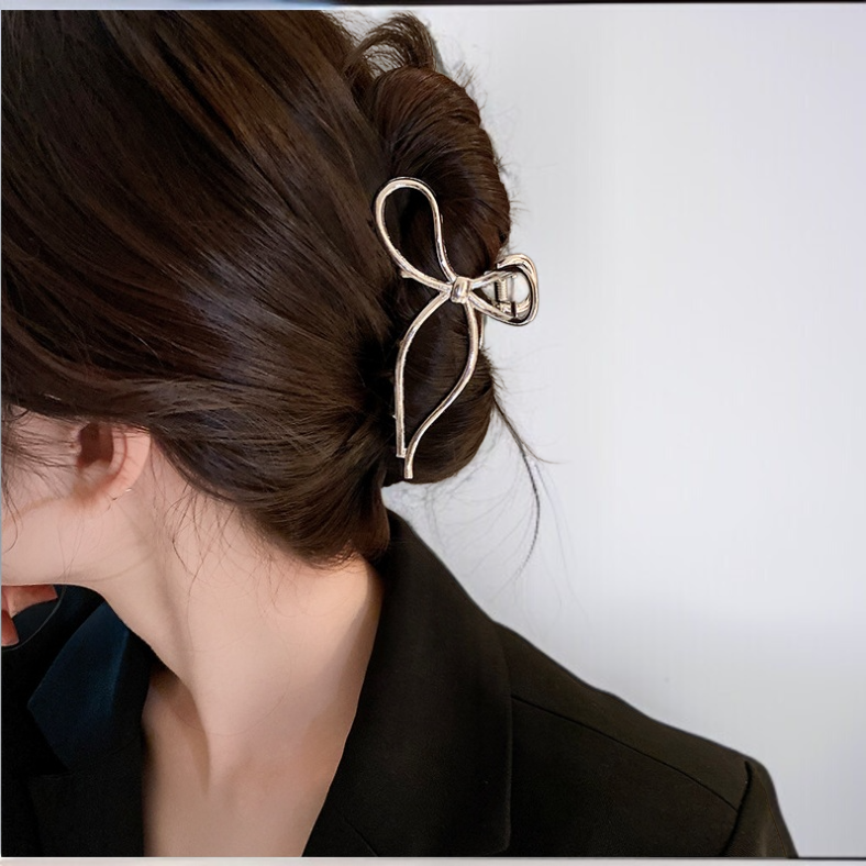 Fashionable bow-shaped metal hair clamp