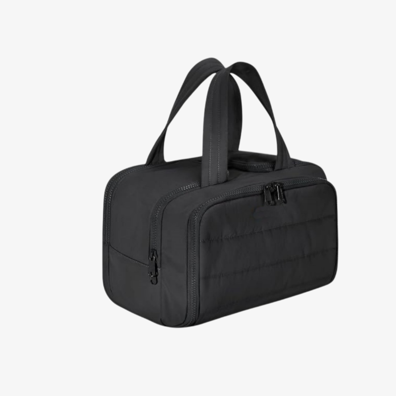 Waterproof travel toiletry bag on bathroom counter