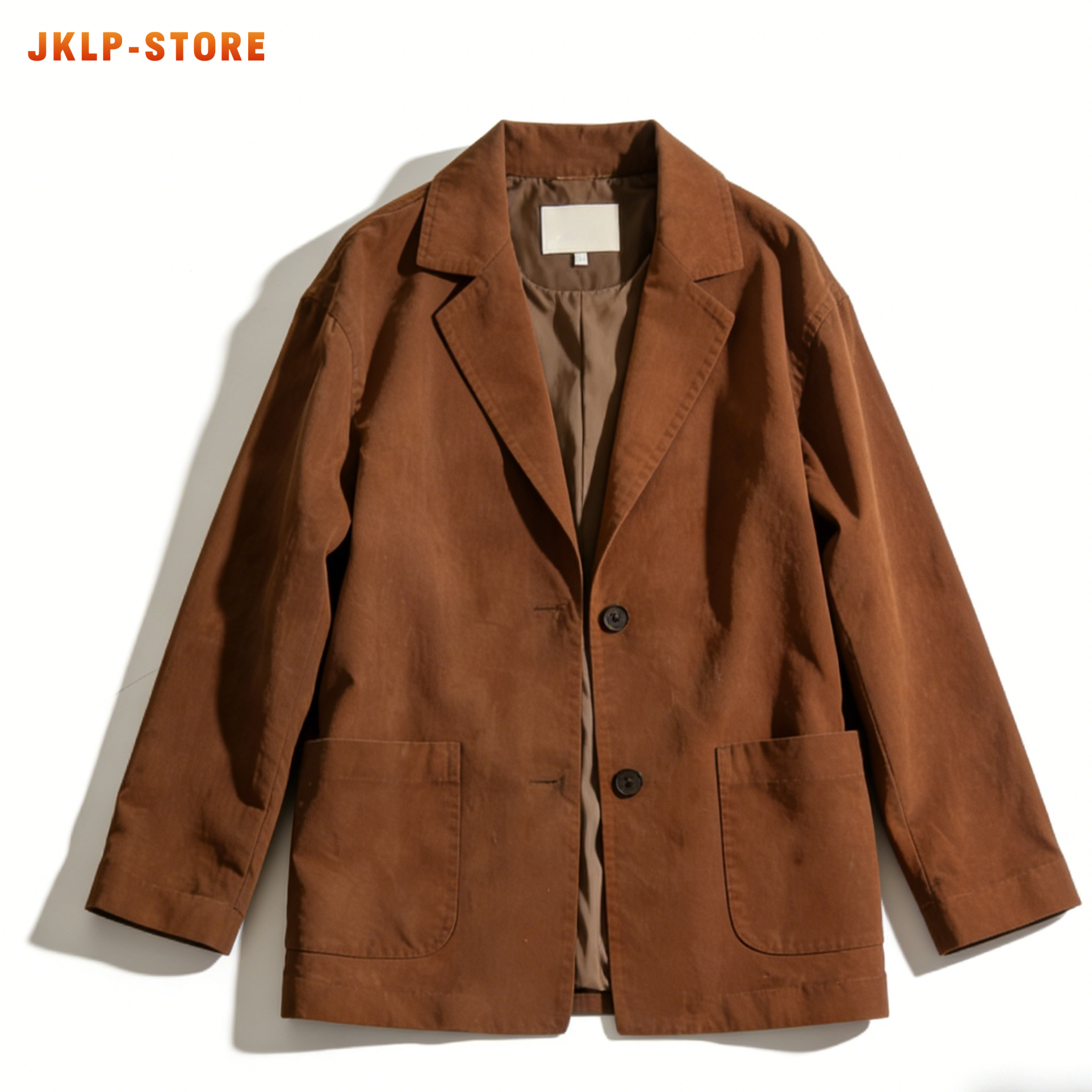 Detalle del tejido de la chaqueta de traje casual de mujer