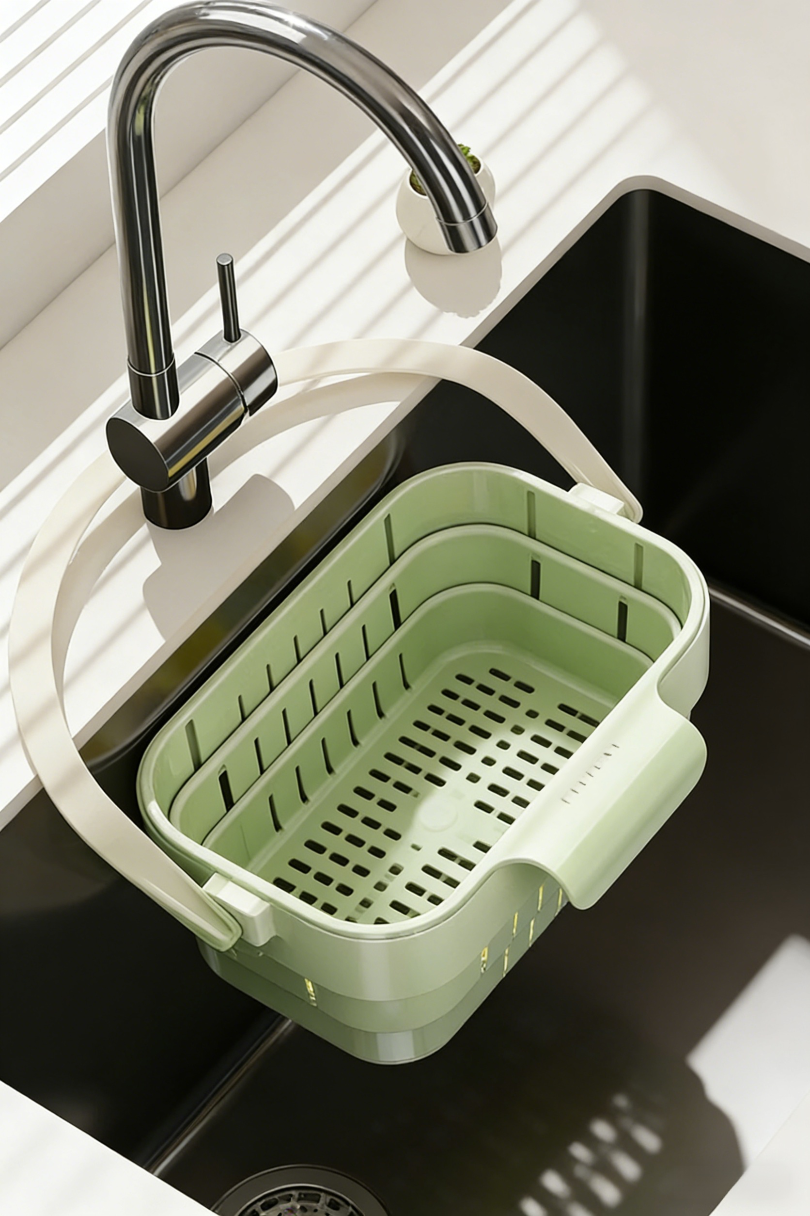 Drain basket hanging on kitchen wall for easy access