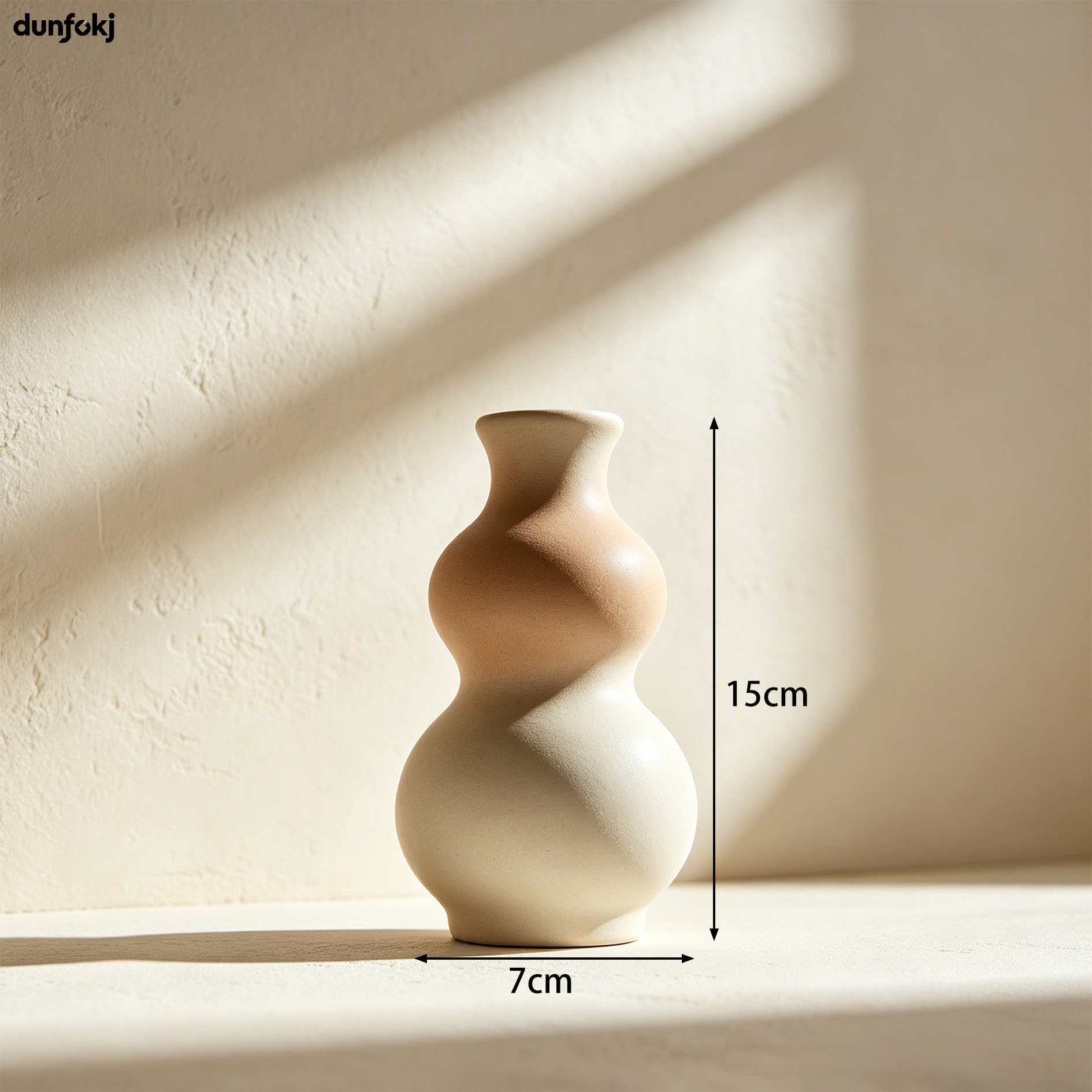 Simple ceramic vases displayed on living room table