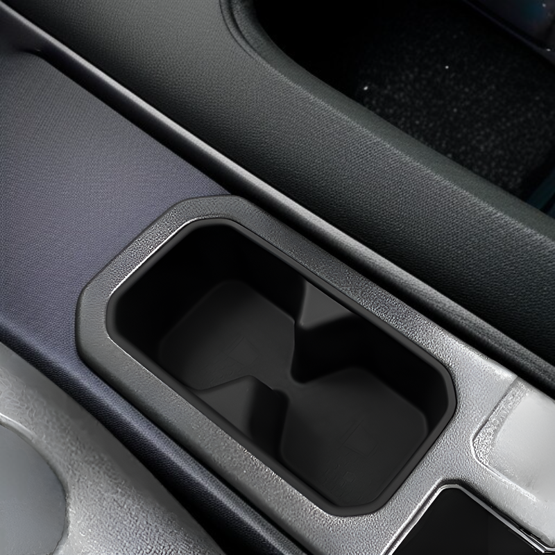 Caja de almacenamiento para portavasos central de coche