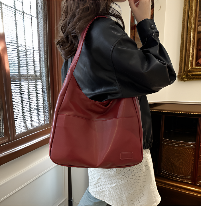 حقيبة يد نسائية عصرية بلون أنيق