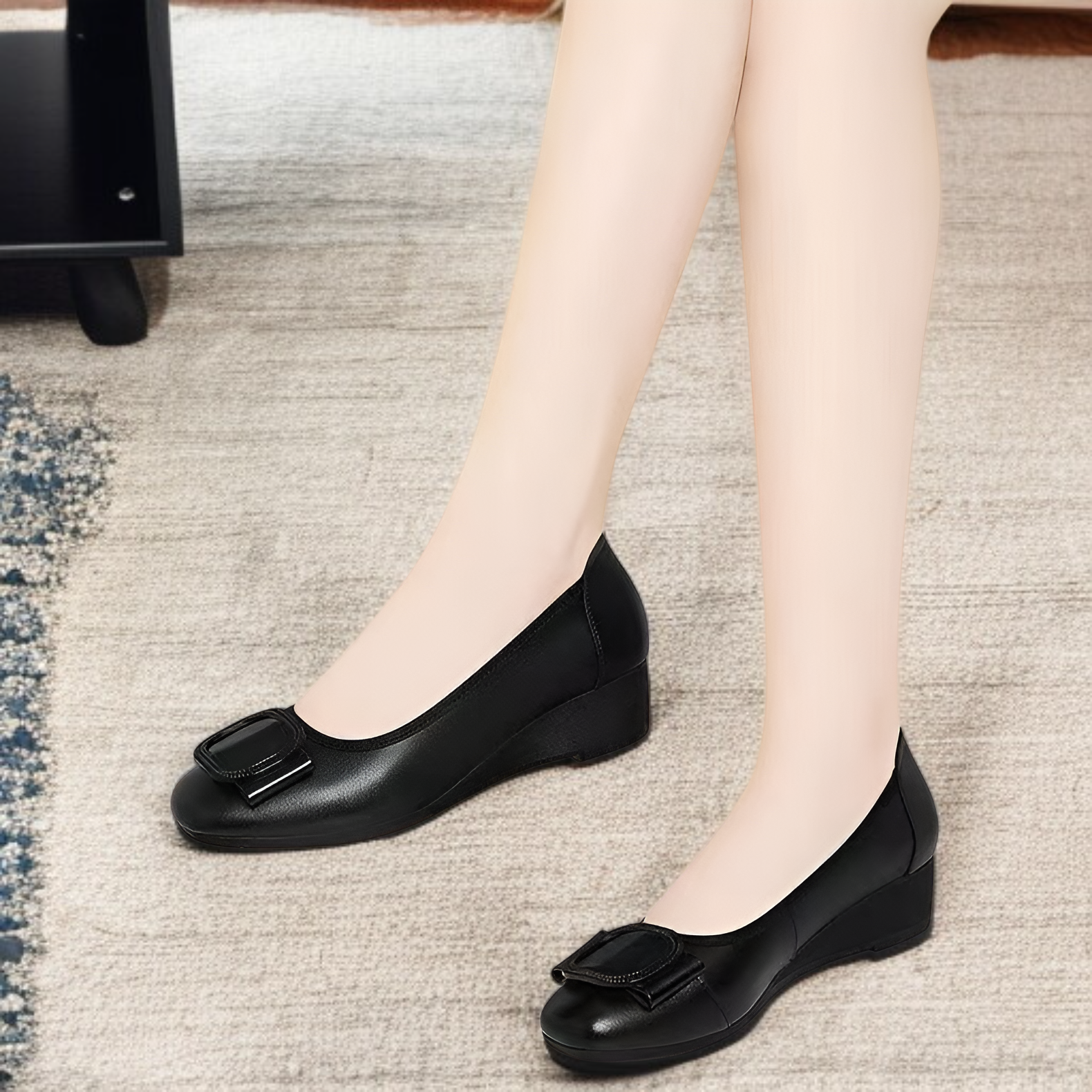 Close-up of women's wedge heel shoe details