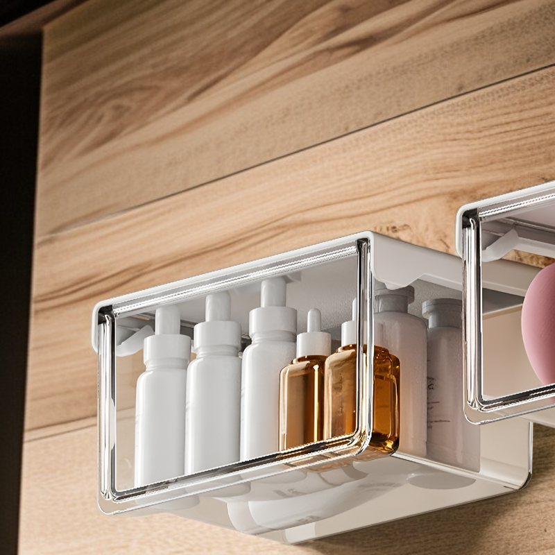 33°の傾斜角度で出し入れしやすいテーブル下収納ボックス。シンプルで透明な引き出し式で、オフィス、トイレ、洗面台、バスルームなどに最適な防水収納ボックスです。