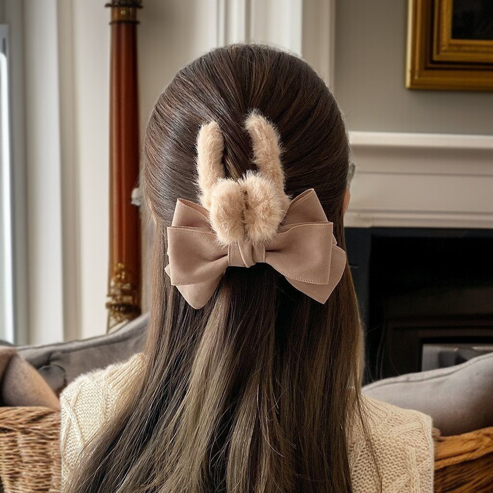 Fashionable hair clip with plush bow design