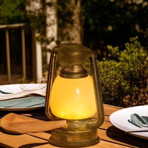 Vintage style camping lamp illuminating a tent