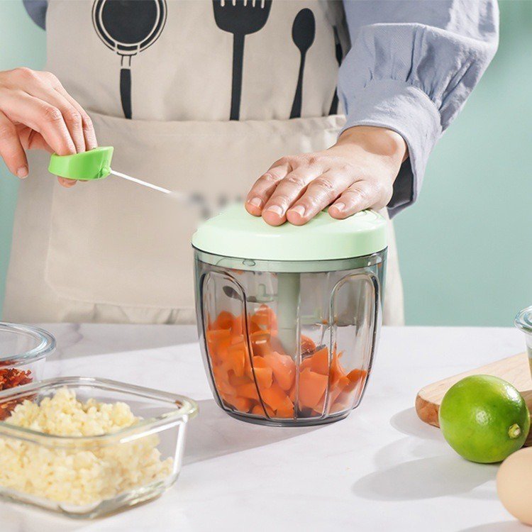 Lindo sacador portátil de ajo