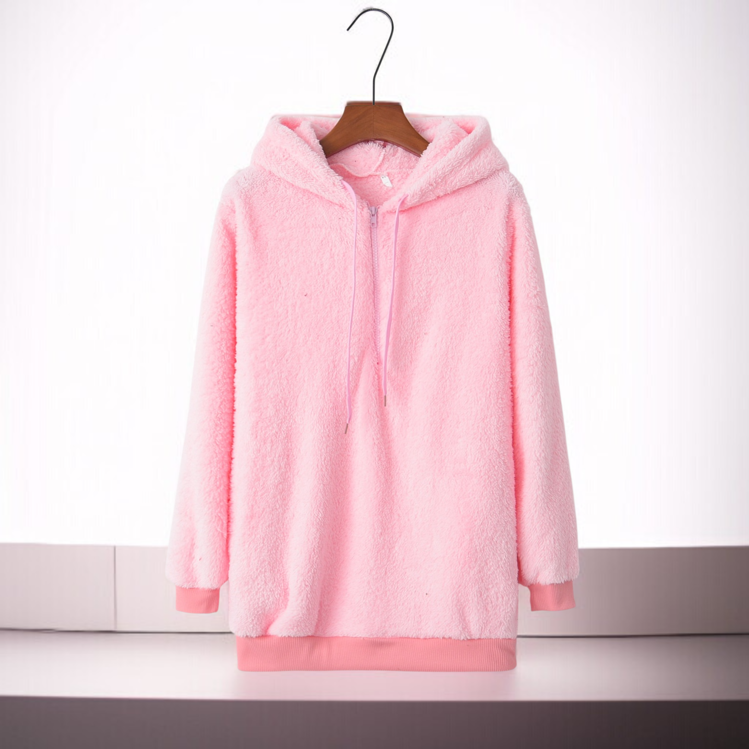 Close-up of soft fleece fabric on women's hoodie