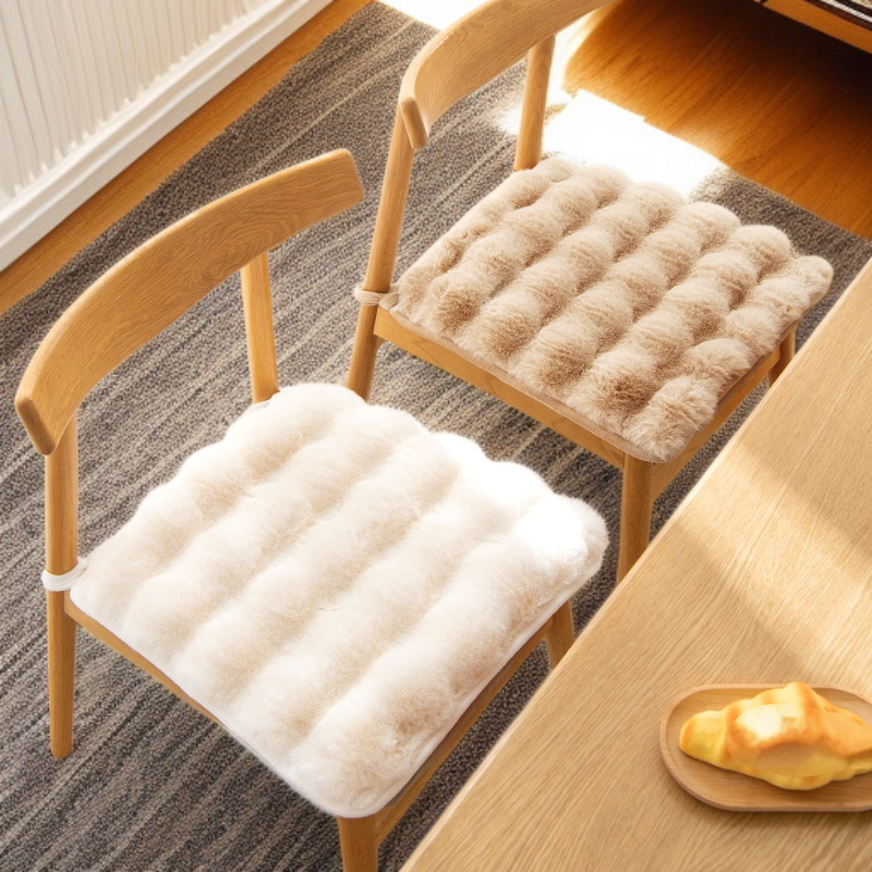 Soft thick cushion on wooden bench