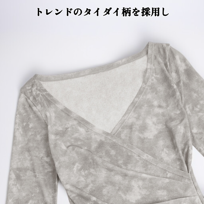 レトロなリボンデザインが特徴的なタイダイ柄の長袖トップス