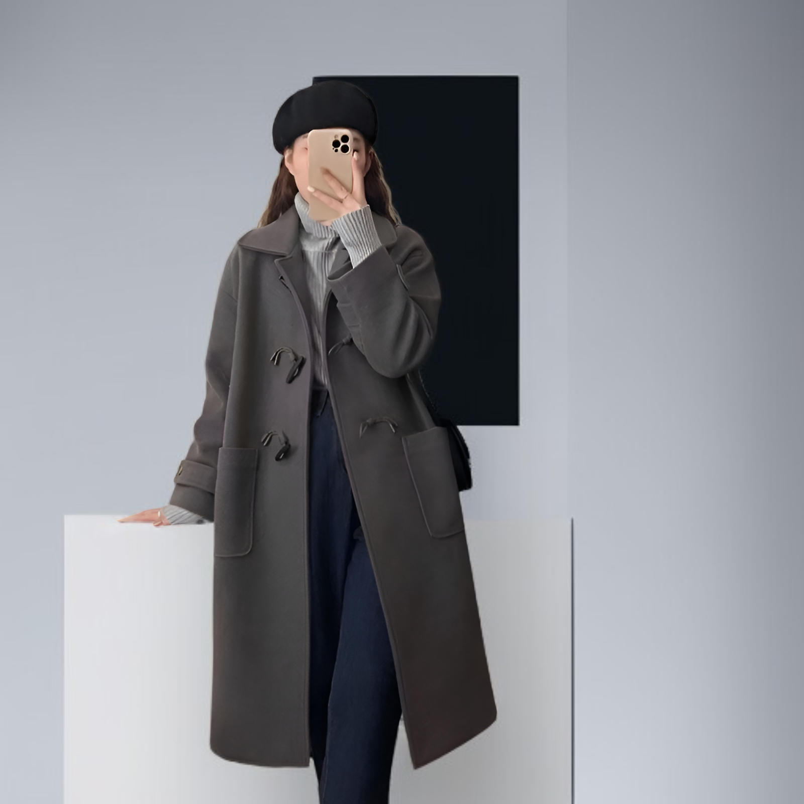 コートの袖部分と角ボタン