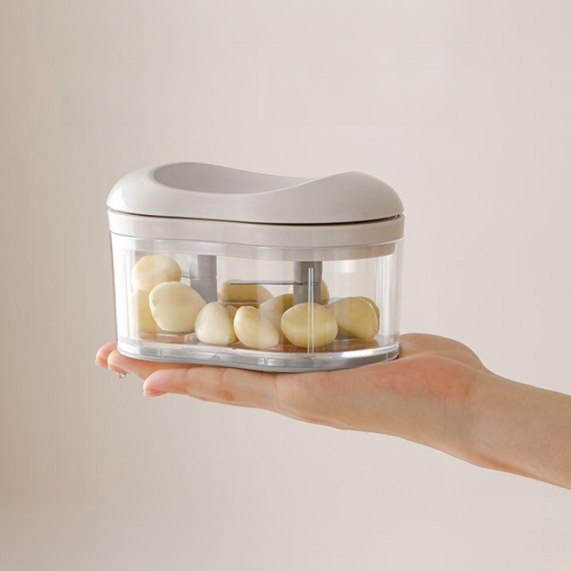 Multi-functional manual garlic mincer