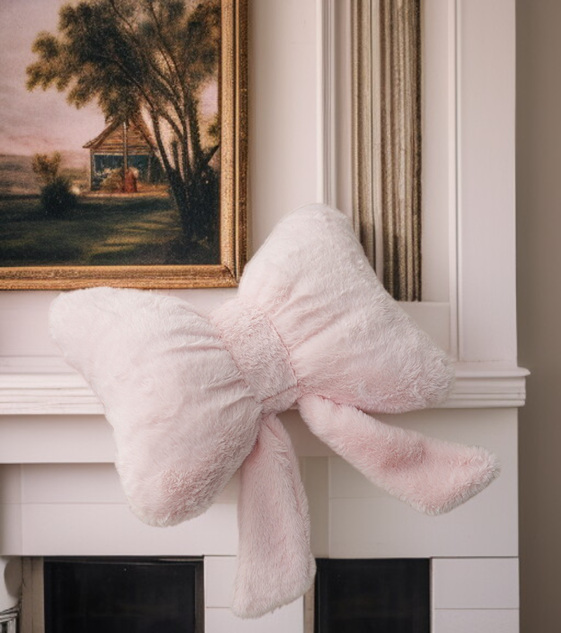 귀여운 리본 디자인이 돋보이는 베개 사진