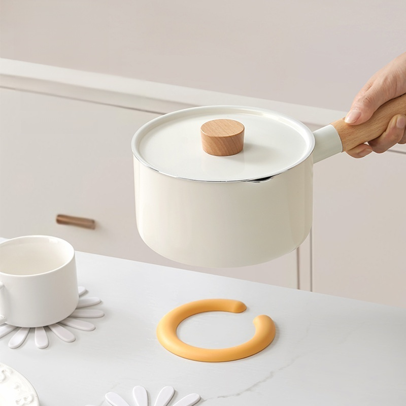 Odnímatelná podložka pod hrnec ve tvaru sedmikrásky