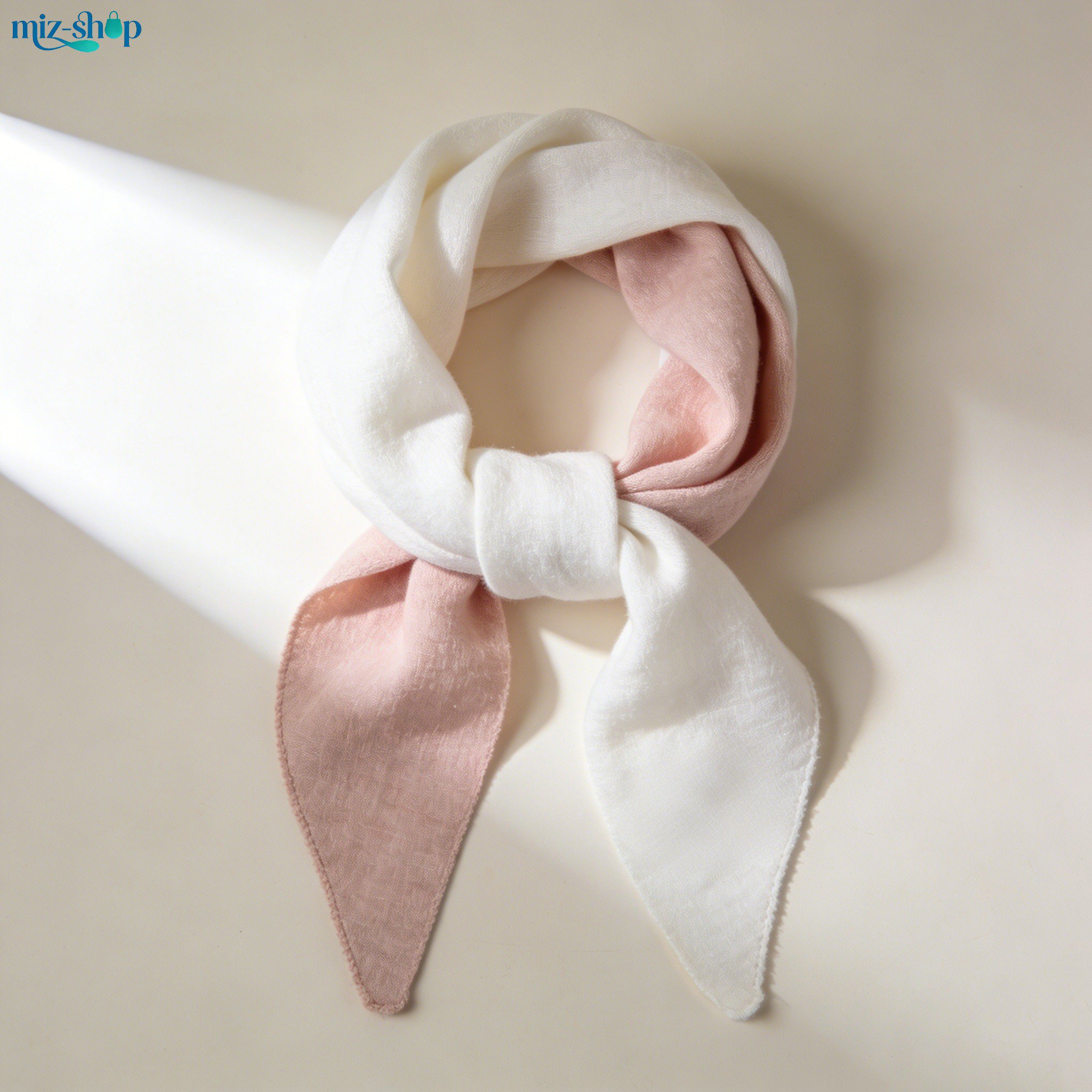 Set of two cotton and linen scarves displayed on a white background