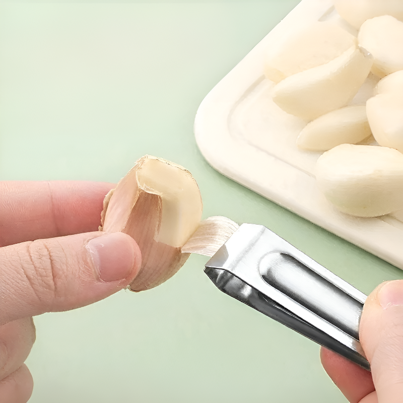 Stainless steel garlic peeler