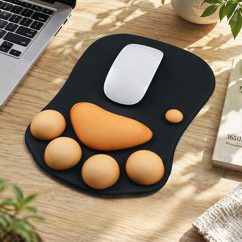 Cute and personalized silicone wrist rest mouse pad with cat paw design for computer laptops.