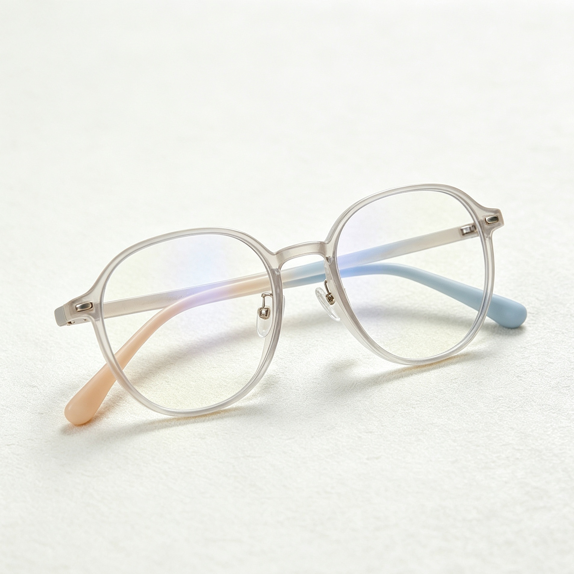 Close-up on gradient lens of round frame glasses